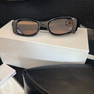 Gentle Monster LIX Oval Sunglasses Black 01 Amber Lenses